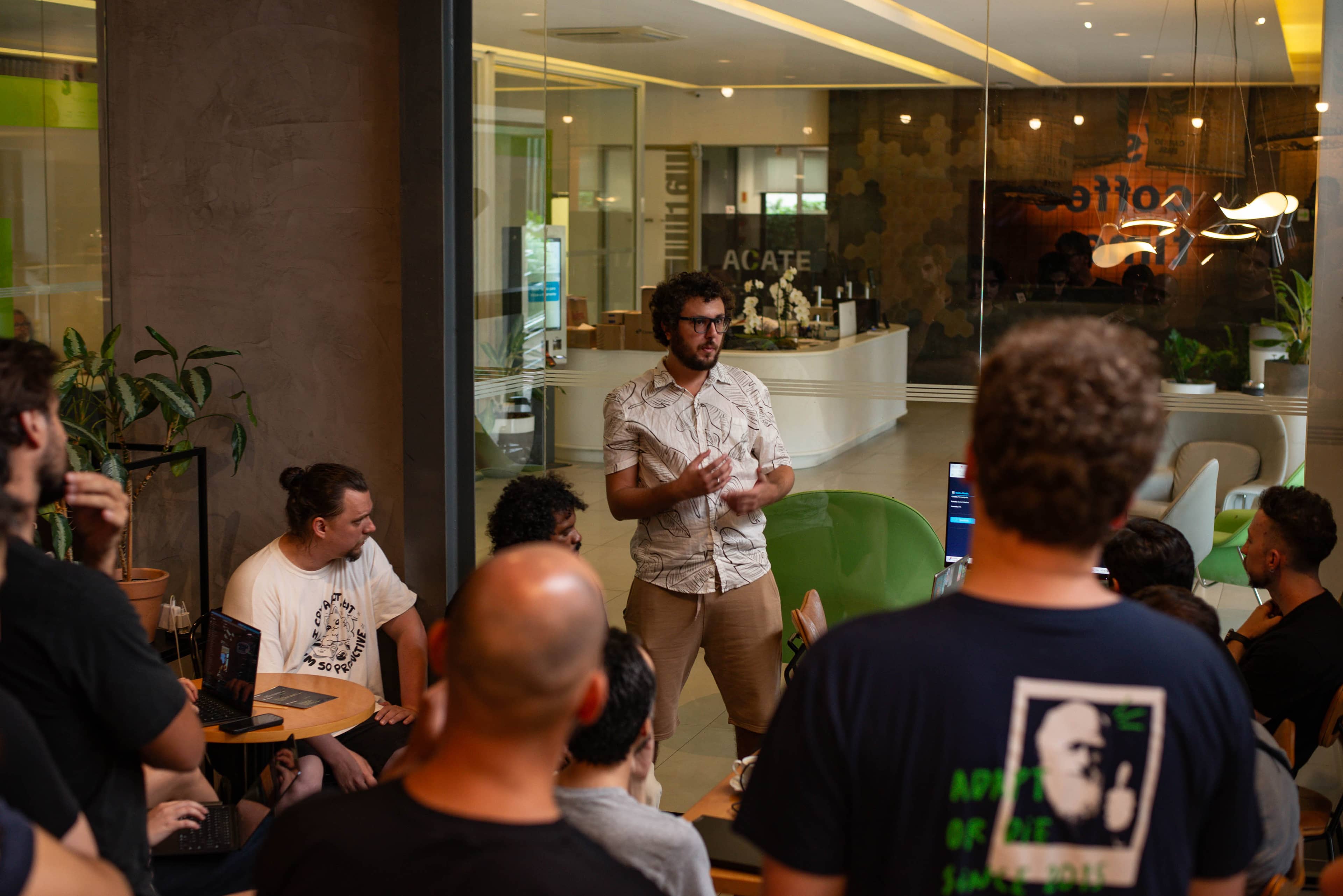 A Cafe Cherri Code gathering with developers working together over coffee.