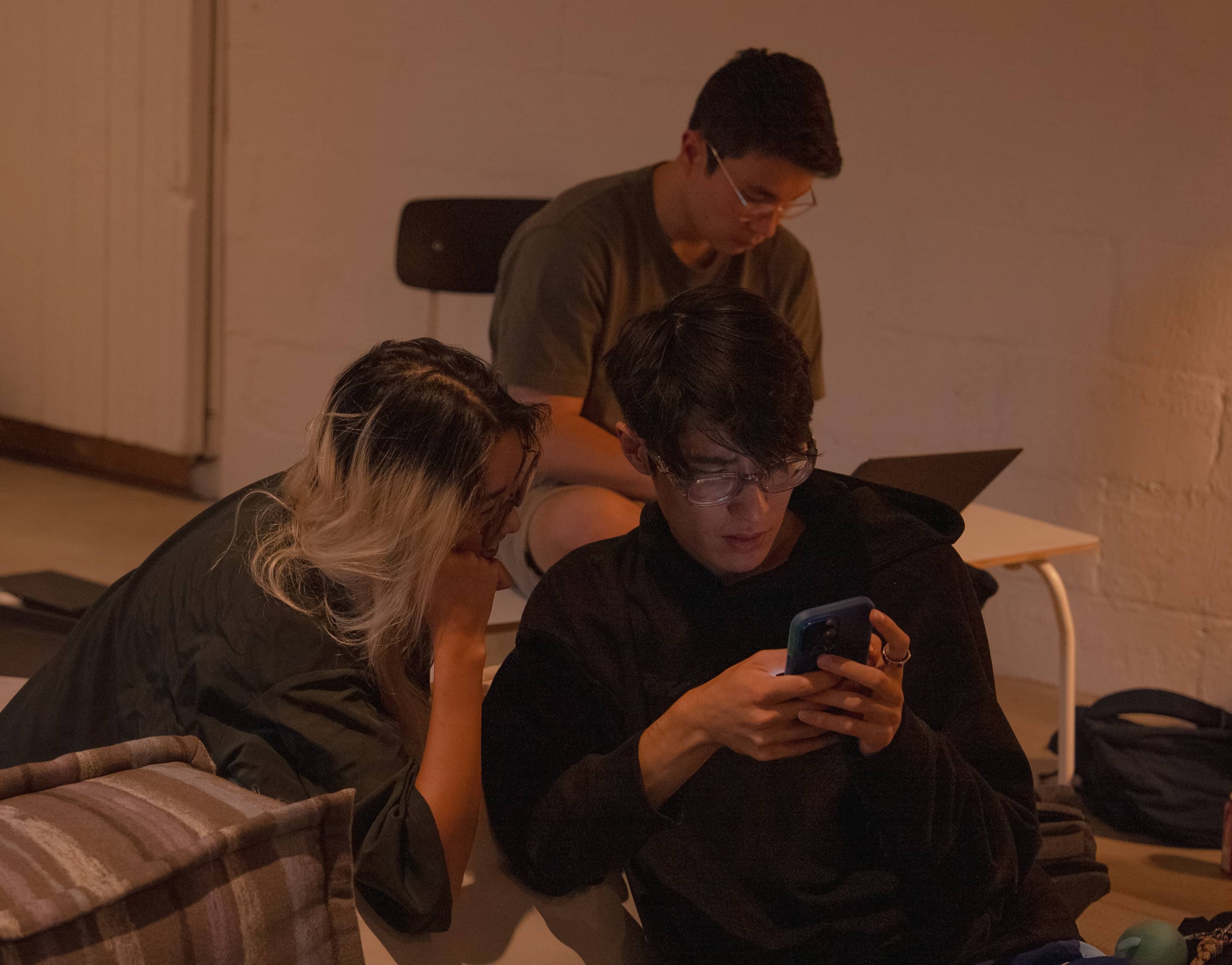 Teams building projects together at a Cherri Code hackathon.